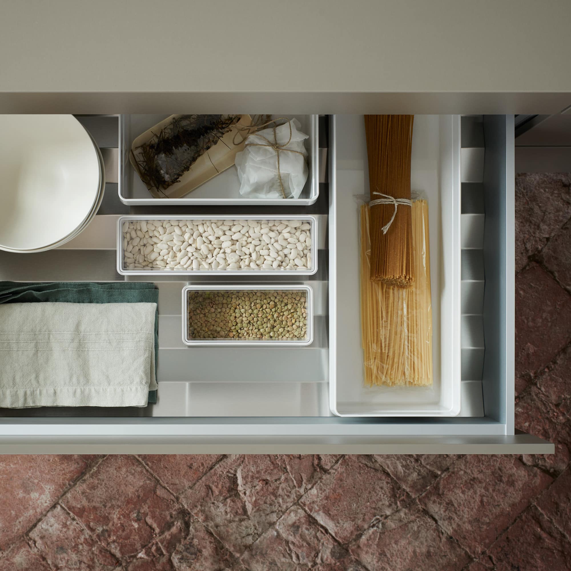 Vorratsbehälter für funktionale Prismen